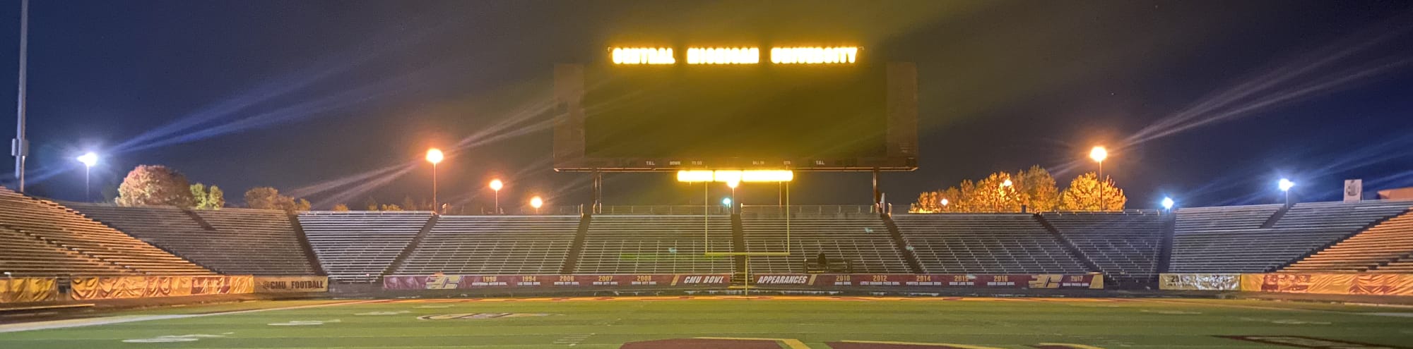 empty football stadium at night under the lights Reno